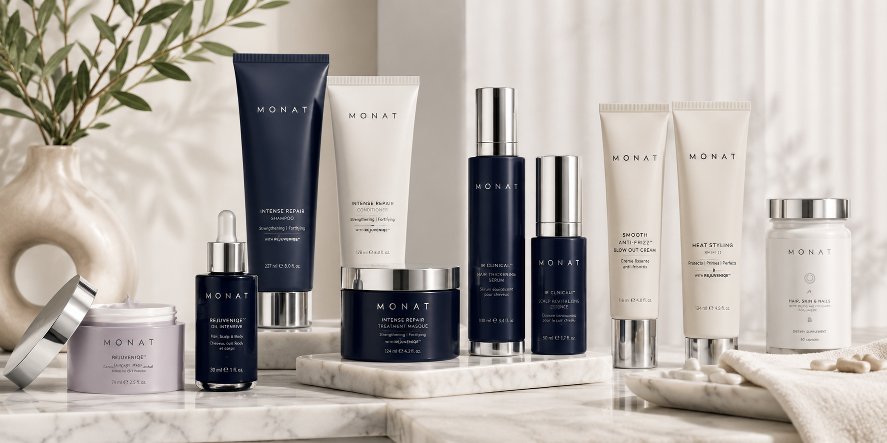 MONAT haircare bottles arranged as a minimalist flat lay